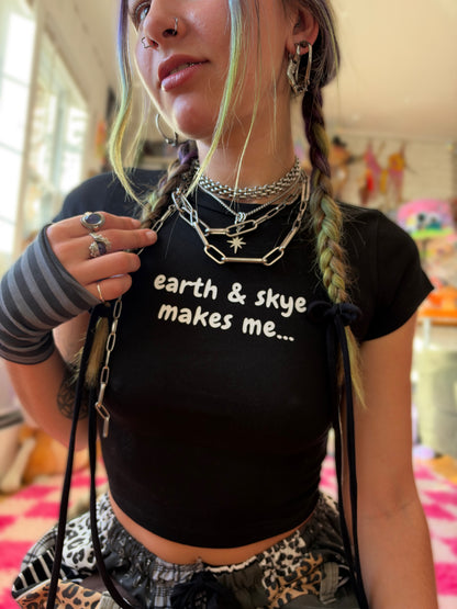 earth & skye makes me... merch baby tee