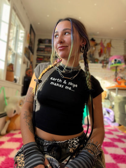 earth & skye makes me... merch baby tee